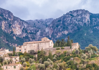 Fototapeta na wymiar Deia a beautiful village in a remote valley in the Serra Tramuntana mountain range, Majorca (Mallorca), Balearic Islands, Spain.