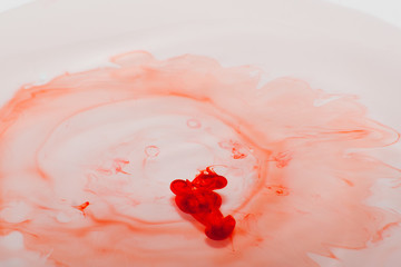 Abstract red food coloring  drop