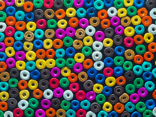 formed with rounded beads colorful abstract background