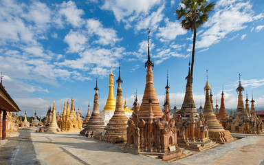 Shan. Myanmar. 11/29/2016. A favorite place for tourist excursions - Takhaung Mwetaw pagoda, where more than 200 stupas, with a unique bas-reliefs. Ragada located on the shores of Inle lake.