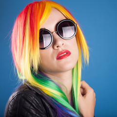 beautiful woman wearing color wig and sunglasses