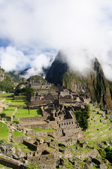 Fototapeta premium The Incan ruins Machu Picchu mysterious city in Peru, South America