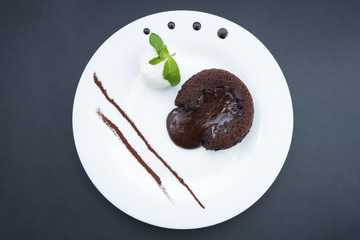 chocolate fondant and frosting on plates