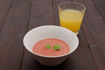 Beetroot soup with chickpeas on a table