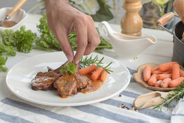 Rack of Lamb with Grilled Peach on white dish