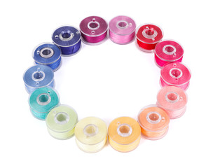 Bobbins with colorful threads