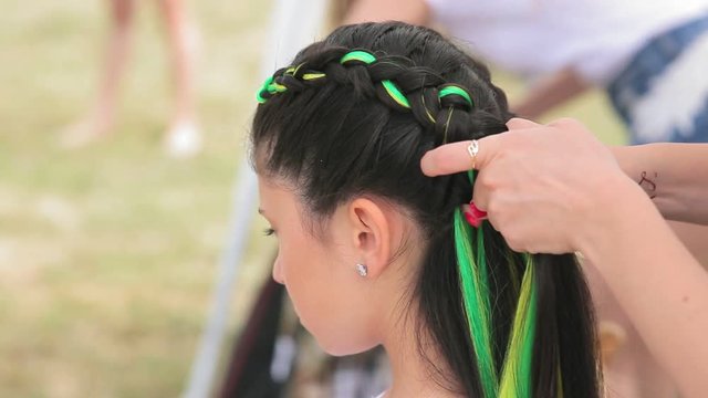 Process of weaving the basic French braid