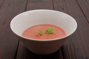 Beetroot soup with chickpeas on a table