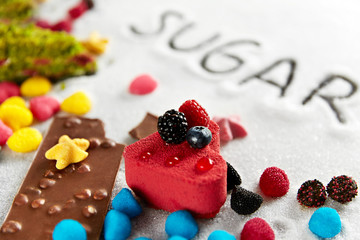 Sugar And Colorful Sweets On Table