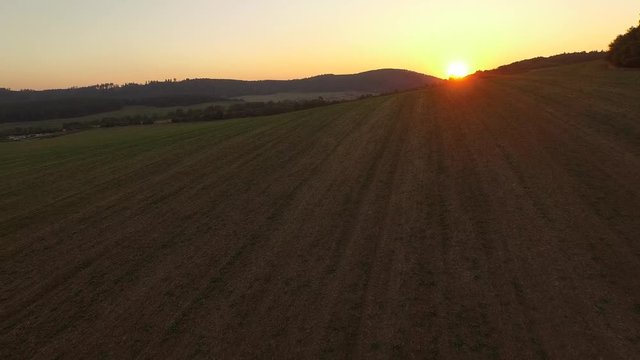 Sunset over autumn field
