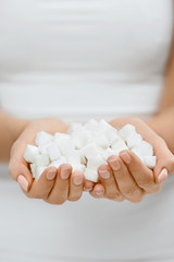 Female Hands With Sugar Cubes.