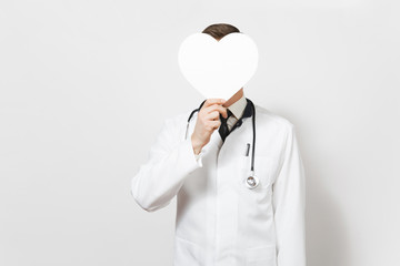 Fun young doctor man isolated on white background. Male doctor in medical uniform, stethoscope holding in front face white figure heart with copy space. Healthcare personnel, health, medicine concept.