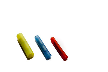 Electrical blue, red and yellow  wire connector nylon, 2 way Splice wire connector on white background.