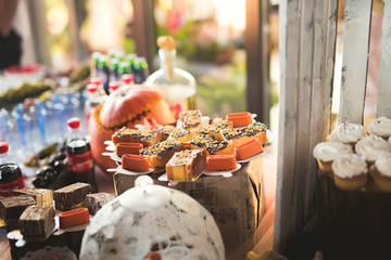 Different kinds of baked sweets on a buffet