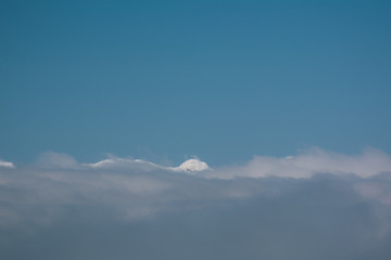 Fototapeta premium Gipfel über den Wolken