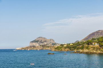 Kayak sailing along the coast in Sicily, Italy