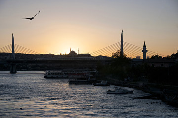 Halic bridge and mosque at sunset in istanbul