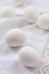 White eggs on a white towel