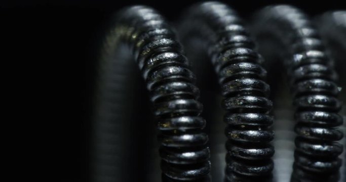 Coil of vape, macro shot. 4K. 
