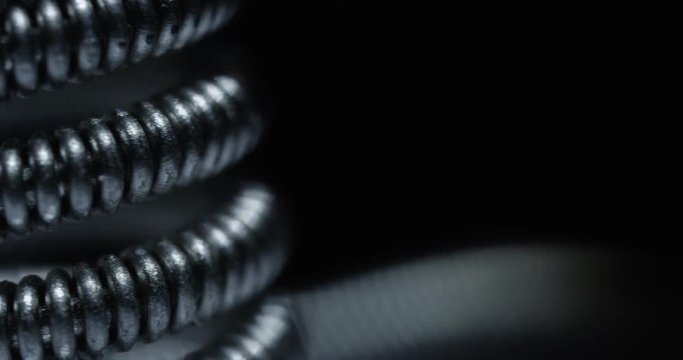 Coil of vape, macro shot. 4K. 
