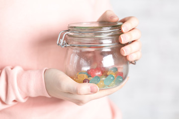Female holg glass jar with jelly