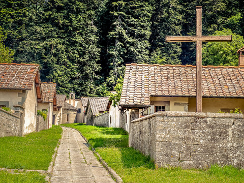 Cross in monastery settlement, Italy