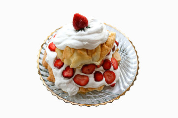 Stawberry two layer pavlova made of meringue and whipped cream - delicious and low carb-keto dessert isolated