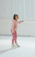 happy little girl at the rink