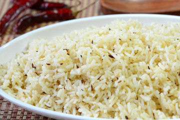 Jeera rice or cumin rice prepared with cooked rice and jeera.
