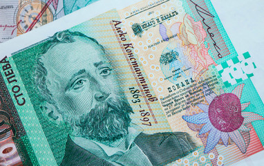 Photo depicts the Bulgarian currency banknote, 100 leva, BGN, close up. Depicts a portraiture of Aleko Konstantinov, famous Bulgarian poet.