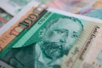 Photo depicts the Bulgarian currency banknote, 100 leva, BGN, close up. Depicts a portraiture of Aleko Konstantinov, famous Bulgarian poet.