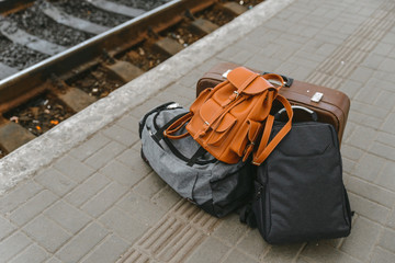 bags at railway station near railroad