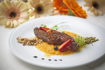 veal with orange sauce and strawberries