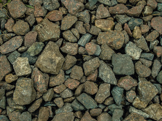 background texture of stone, crushed stone and brick
