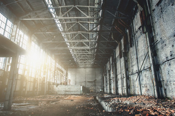 Abandoned ruined industrial factory building, ruins and demolition