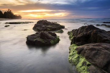 Fototapeta na wymiar seascape at the beach with natural coasltal rocks.