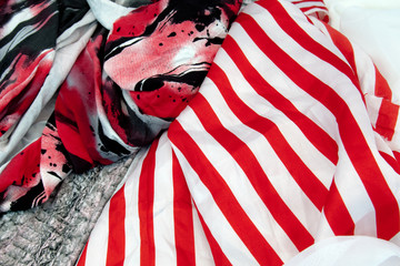 Red white and black colored crinceld fabric with spots