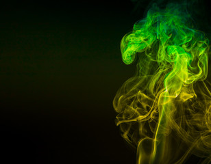 Colored smoke on black background