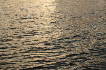 Sea of light with the surface of the water is a beautiful pattern 