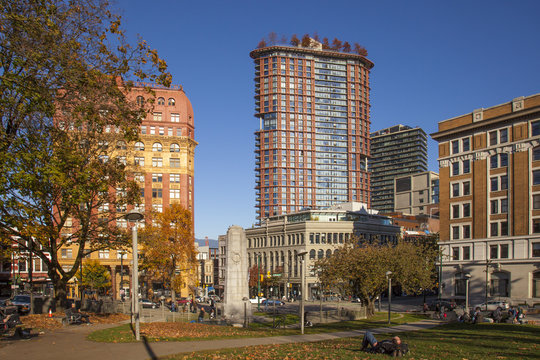 Victory Square Park in downtown Vancouver on a warm autumn day