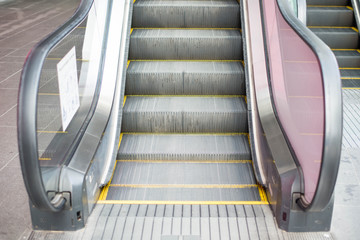 Escalator in department store.