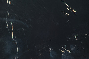 Black texture of the painted board with scratches. Black blackboard slate with nothing on it. Blank chalkboard