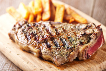 Grilled beefsteak with french fries