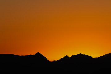 mountain silhouette in the Negev desert in Israel at sunset sunrise