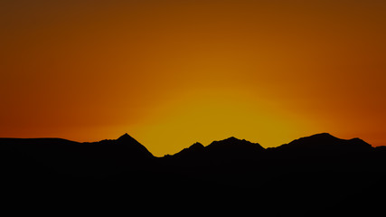 mountain silhouette in the Negev desert in Israel at sunset sunrise
