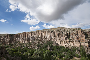 Fototapeta na wymiar Ihlara Valley in Cappadocia. Ihlara Valley (Peristrema Monastery) or Ihlara Gorge is the most famous valley in Turkey for hiking excursions.