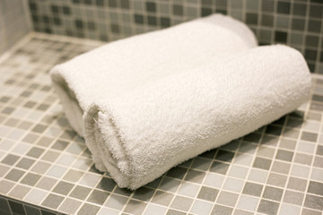 Obraz na płótnie Canvas Towels in hotel bathroom