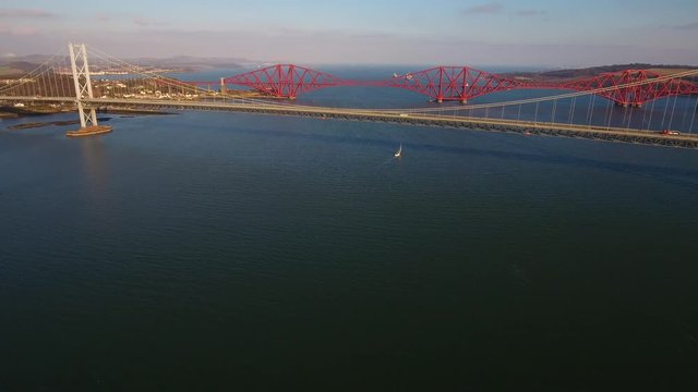 Aerial footage of the old Forth Road Bridge and the Railway Bridge.