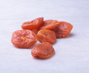 dried apricots isolated white background. selective focus.