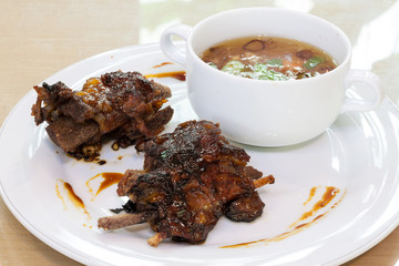 Grilled Cow Rib on a White Plate